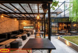 Thiết kế quán cafe sân vườn mang hơi thở từ phong cách industrial